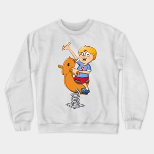 The happy boy on the spring rider. Crewneck Sweatshirt